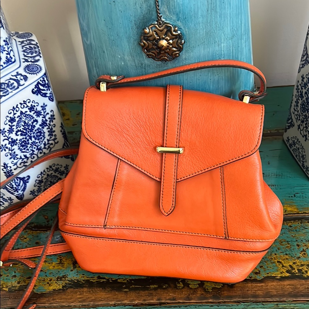 Vibrant Orange Leather Backpack with Adjustable Straps